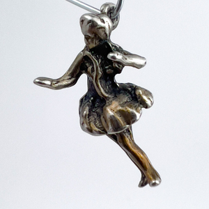 lot 142 image: Dancing lady, Unknown Maker, VINTAGE Sterling Silver Solid Cast Charm.