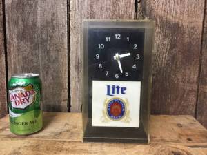 lot 57 image: Vintage Miller Brewing Lite Cub Clock