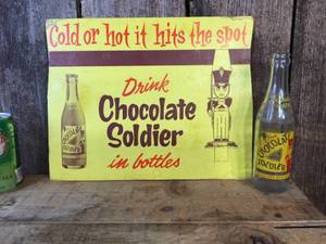 lot 96 image: Vintage Chocolate Soldier Cardboard Advertiser & Bottle