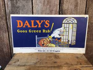 lot 97 image: Vintage DALYS Goos Greez Rub Cardboard Advertiser