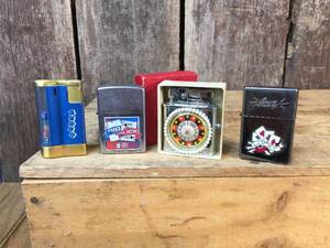 lot 118 image: 4 Vintage Gaming Themed Lighters