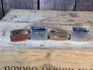 lot 121 image: 4 Vintage Lighters