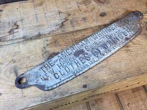 lot 148 image: Antique The AMERICAN Wringer Co. Badge