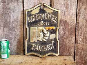 lot 203 image: Golden Finger Tavern Embossed Metal Sign
