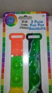 lot 509 image: 10 Pack Pixar Boys Club Ankle Socks and Fidget Pop it Bracelet (2pk )