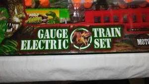 lot 816 image: Battery Operated Dinosaur Toy Train with Tracks