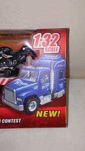lot 814 image: Friction-Powered Semi-Truck with Motorcycles Set