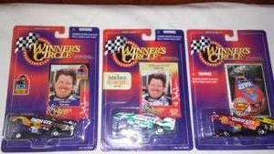 lot 647 image: John Force Funny Car Dragsters, Winners Circle 164