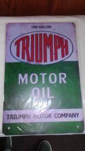 lot 581 image: Triumph Motor Oil Metal Sign.