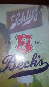 lot 593 image: Becks Beer Schlitz Metal Sign