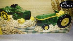 lot 656 image: John Deere Salt and Pepper shakers.