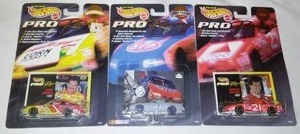 lot 693 image: NASCAR Hot Wheels Pro, NEW IN PACKAGE, LaBonte, Waltrip, Petty team. (3)