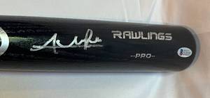 lot 20 image: Kyle Schwarber Signed Bat with Beckett Certification, New Rawlings Pro Bat, Chicago Cubs Baseball Autograph