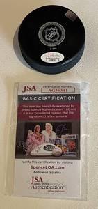 lot 92 image: Mike Reilly Signed NHL Hockey Puck with JSA COA