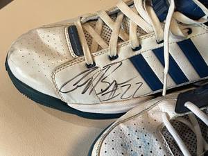 lot 120 image: Timberwolves Autographed Basketball and Six Game Used and Signed Shoes