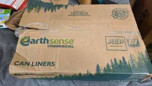 Squished box of Earth Sense Commercial 31-33 Gallon Can Liners