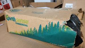 Squished box of Earth Sense Commercial 55-60 Gallon Can Liners