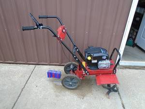 Toro 20 roto tiller. Lightly used. Tested & works. As shown. THIS ITEM HAS A RESERVE.