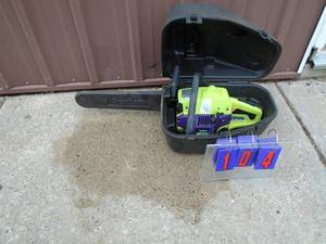 Poulan chainsaw in case. Used condition. Tested & works. As shown.