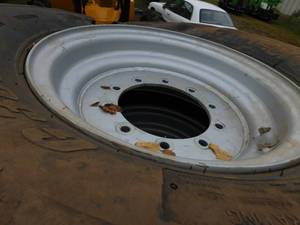 lot 38 image: 4 - Foam Filled Rough Terrain Telehandler Tires on Rims