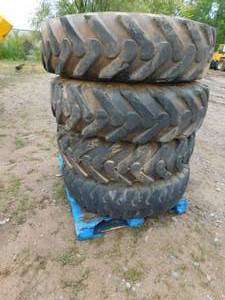 lot 39 image: 4 - Misc. Foam Filled Rough Terrain Telehandler Tires on Rims