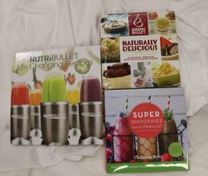 lot 5 image: NutriBullet Recipe Books (3) - Look Brand New