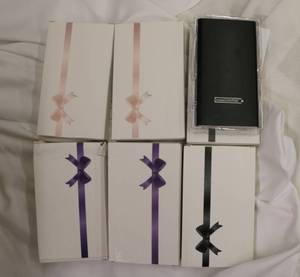 lot 7 image: Portable Power banks (6)  5000mh each 2 pink, 2 lavender, 2 black (3 units per box - 6 total)