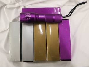 lot 8 image: Flashlights Sturdy metal   (6) Adjustable light intensity. 2 gold, 2 silver 2 purple.