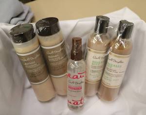 lot 35 image: CAROLs DAUGHTER  2 shampoo & conditioner sets, 1 finishing spray