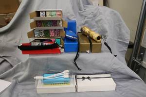 lot 119 image: BELL & Howell 22 Flashlights& 19 Nice Pens, 2 InstaCHARGE Powerpacks