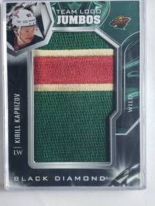 lot 34 image: Kirill Kaprizov 2022-23 Black Diamond Hockey Team Logo Jumbo Relic No. TL-KA