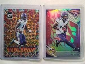 lot 201 image: Lot of 2 Stefon Diggs Inserts 2018 Panini Phoenix No. 62 Numbered 106199, 2018 Panini Optic Explosive No. 12