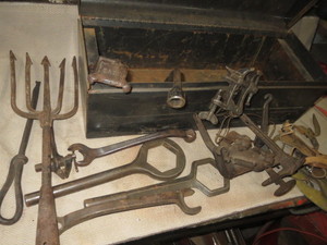 lot 52 image: Gray Tool box with lots of Antiques