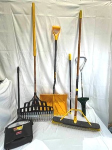 lot 31 image: Garage Tool Lot - Push Broom, Lawn Rake, Bulb Planter, Snow Shovel, Mr. Long Arm, Upright Dust Pan