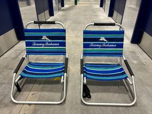 lot 68 image: Two Tommy Bahama Folding Beach Chairs