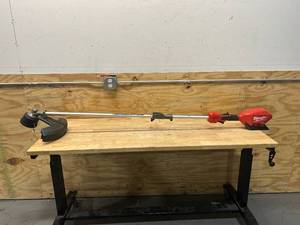 lot 23 image: MILWAUKEE M18 FUEL 18V Lithium-Ion Cordless Brushless String Grass Trimmer with Attachment Capability (Tool-Only)