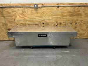lot 38 image: HUSKY 71.36 in. Diamond Plate Aluminum Full Size Crossbed Truck Tool Box