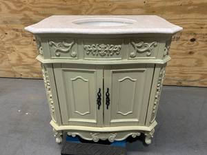 lot 68 image: HOME DECORATORS COLLECTION Winslow 33 in. W x 22 in. D x 35 in. H Single Sink Freestanding Bath Vanity in Antique White with White Marble Top
