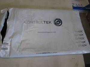 lot 215 image: Pack of 12x16 TripLok Security Bags...