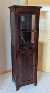 lot 14 image: Petite Glass Door Wood Cabinet
