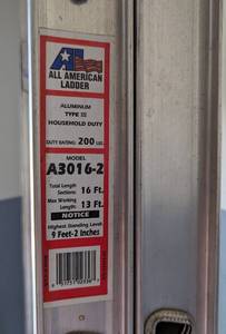 lot 46 image: All American Aluminum Extension Ladder
