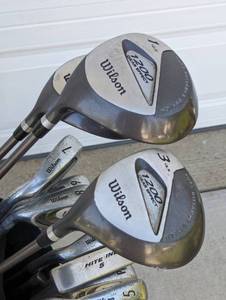 lot 55 image: Wilson Left Handed Golf Club Set and Rolling Cart