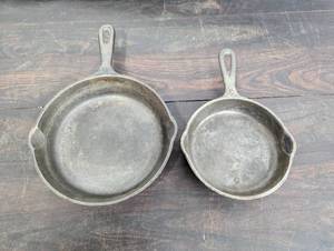 lot 77 image: Pair of Cast Iron Pans
