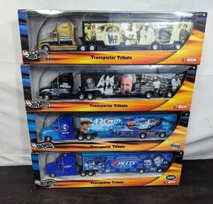 lot 106 image: 4 Model Hot Wheels Transporters