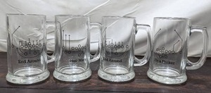 lot 131 image: Set Of Four Football Play Glass Mugs