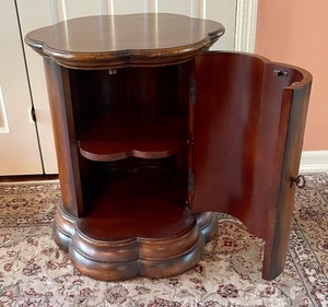lot 130 image: Seven Seas by Hooker Accent Table  Cabinet