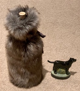 lot 229 image: Fun Fuzzy Bottle Gift Bag and Dog Bottle Opener