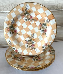 lot 37 image: Three Mackenzie Childs Orange Marmalade Platters