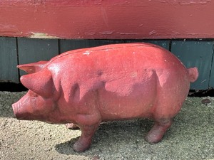 lot 104 image: Red Painted Cast Iron Pig Figurine