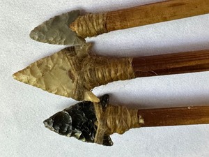 lot 74 image: Three Vintage Hand Crafted Arrows with Suede Case
